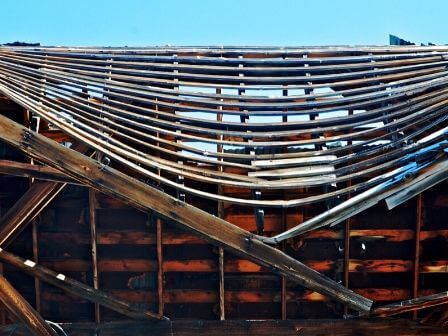 4 Signs That You May Need to Replace the Roof on Your Commercial Building